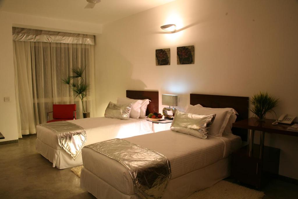 バンガロール パープル ロータス ブティック スイーツアパートホテル 部屋 写真